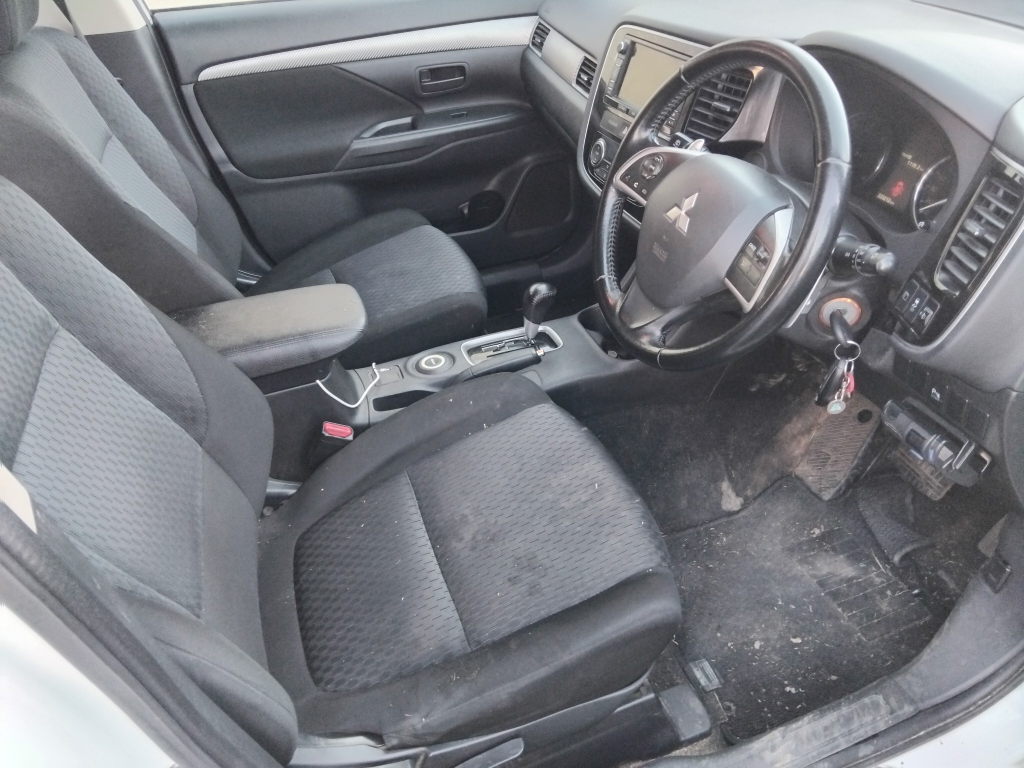 Interior before detailing - dirty floor and seats